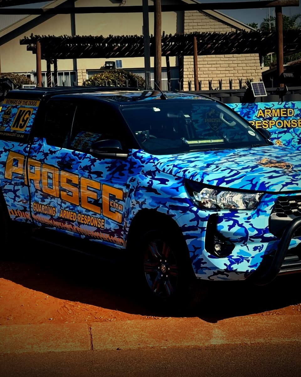 A Prosec CITR patrol bakkie wrapped in blue camouflage, parked at the company's premises